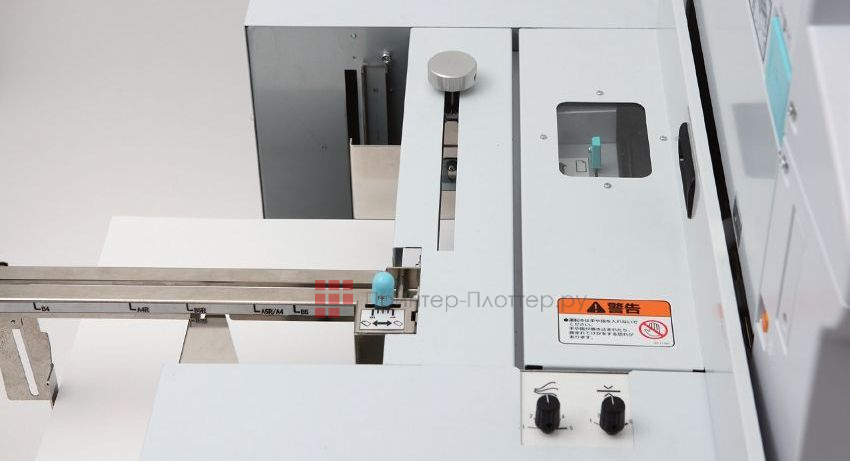 Duplo DP-U950. Подающий лоток